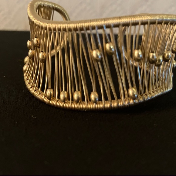 Designer gold bracelet balls move up and down the bracelet with wrist. - Picture 3 of 6